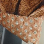 Example of a hem facing of a fabric different from the dress.